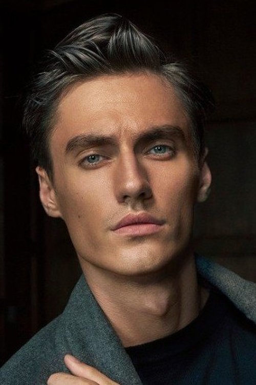 Aleksey Shamayev as TV announcer