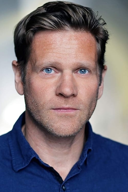 Adam Astill as Older JFK