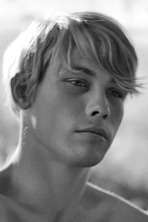 Tom as (archive footage)