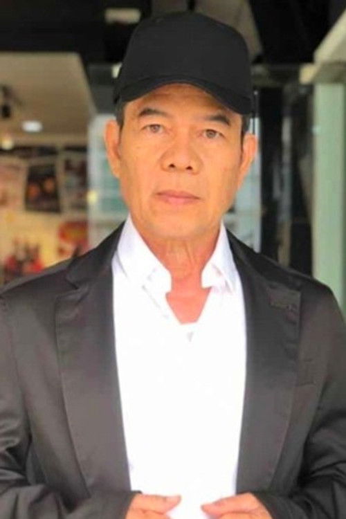 Zaidi Omar as Bomoh Juni