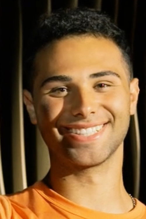 Cole Rutman as Extra #1