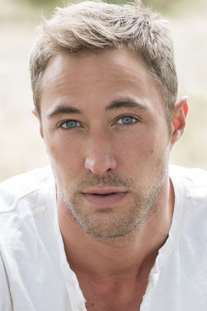 Kyle Lowder as Travis Hunter