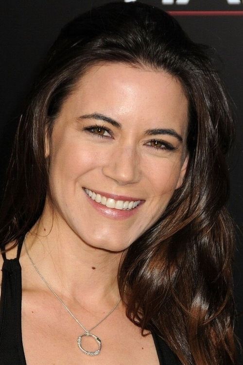 Nathalie Fay as Flight Attendant