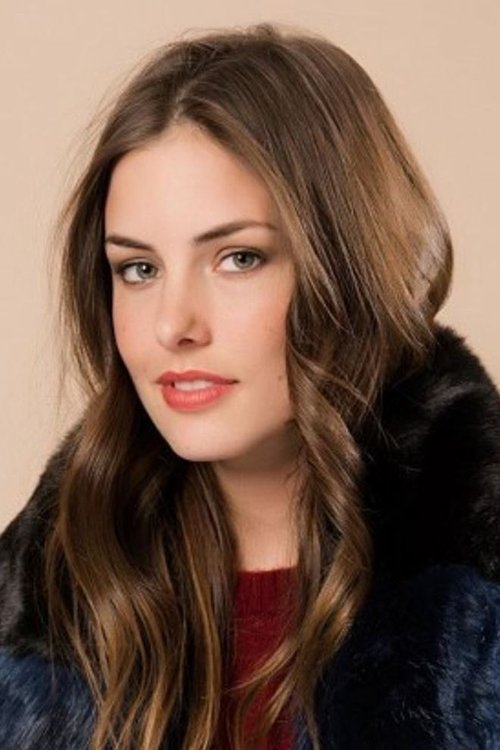 Elyssa Erhardt as American foreign ambassador