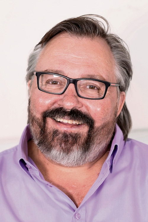 Niekie van den Berg as Dominee Botha