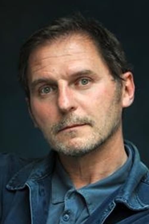 Nicolas Jouhet as Cafe Owner