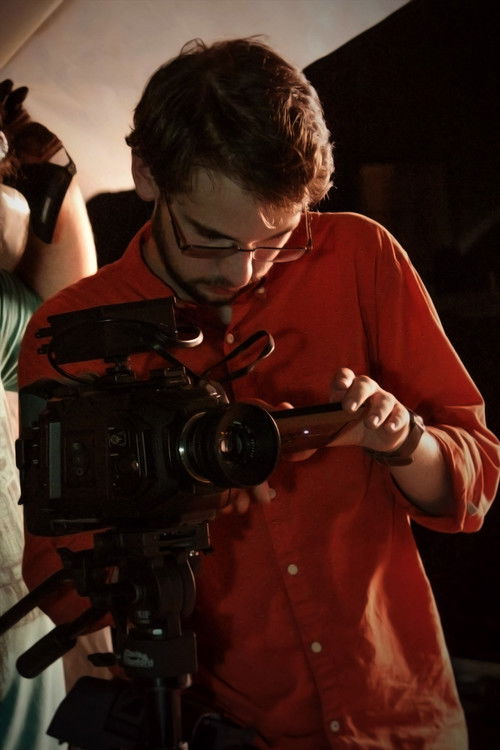 Cade Tindell as Divorce Lawyer; Reporter 5 (voice)