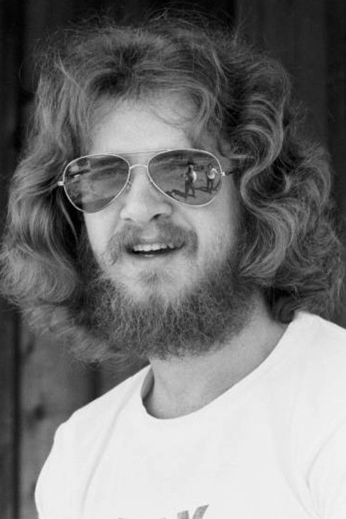 Lee Loughnane as trumpet, vocals