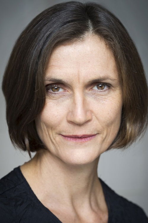 Beth Kayes as Woman at Takeaway Bar