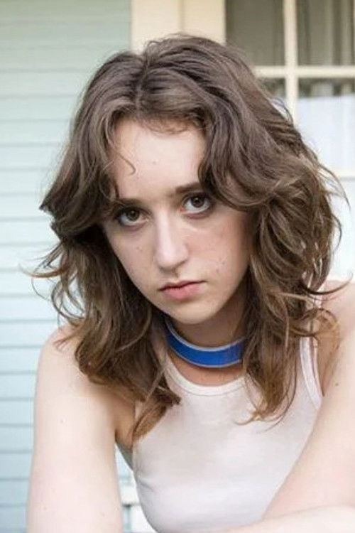 Lucia Ribisi as Logan