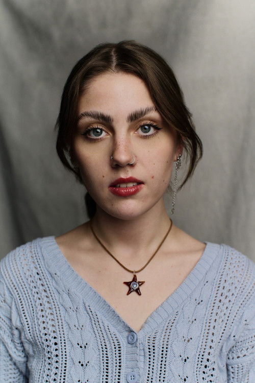 Jasmine Rio Taylor as Inmate 69 / Elizabeth