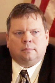 Robert J. Baker as Assistant Director