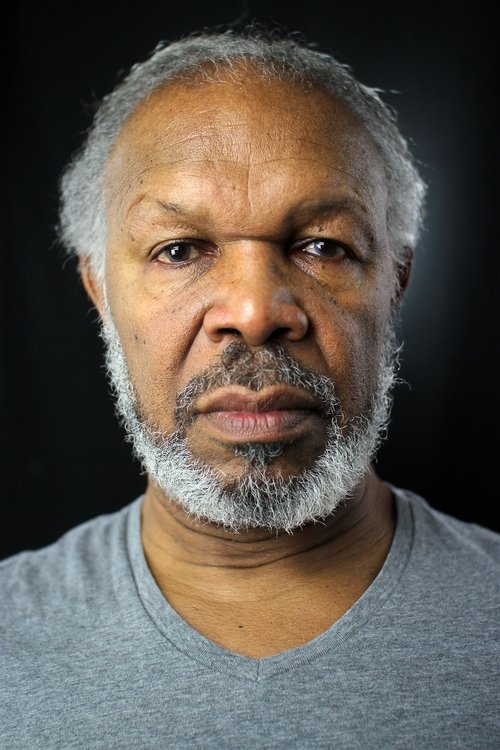 Elester Latham as Displaced Man