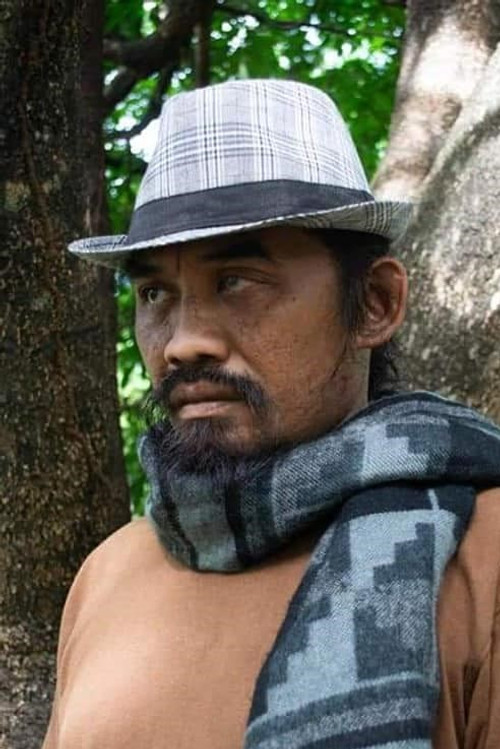 Antonio Adlawan as Bus Passenger