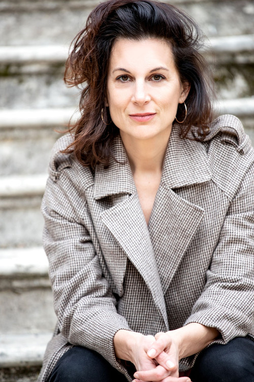 Laura Riccioli as Angelica, the Italian screenwriter