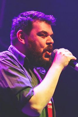 Alexandros Harizanis as Commercial Narrator (voice)