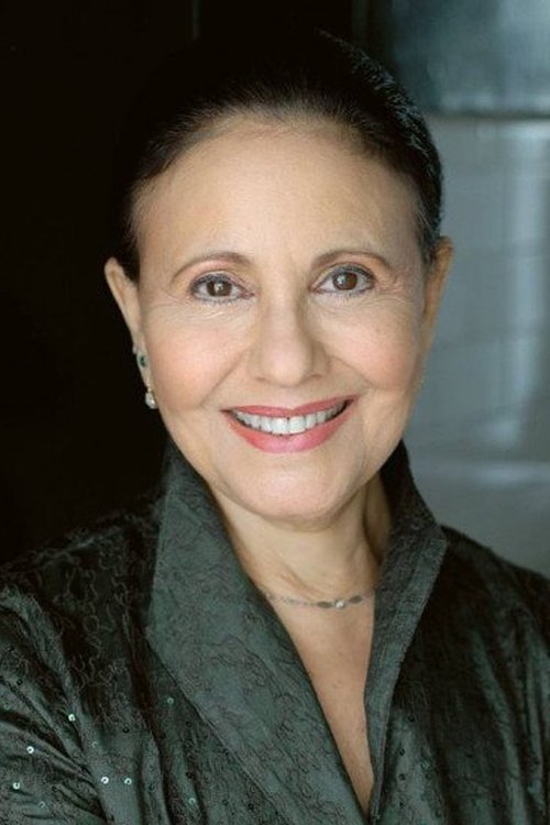 Julie Garfield as The Judge