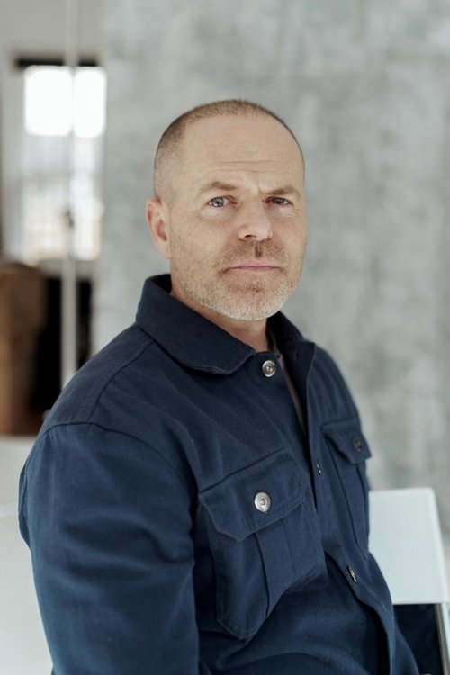 Tristan Heanue as Young Priest