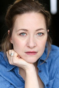 Elise Berthelier as Woman in confessional