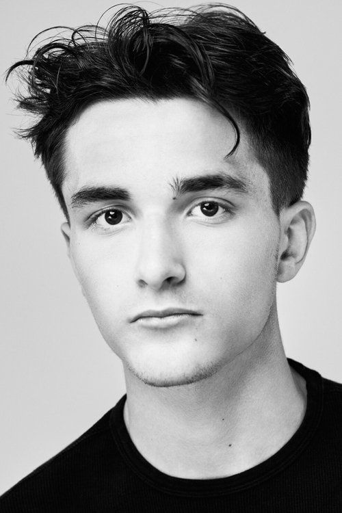 Ryan David Younes as The Director