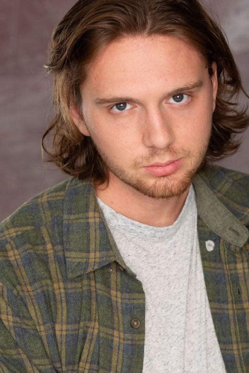 Zach Hurley as Travis