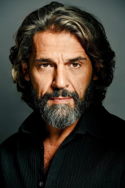 Oscar Foronda as Company Man