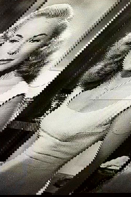 Andrea Bayard as Louise Dunning / Kitty Herman