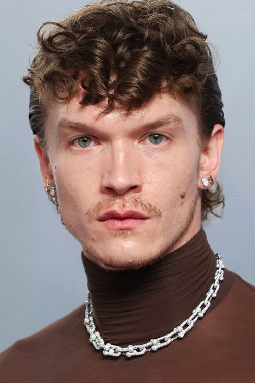 Connor Storrie as Black figure