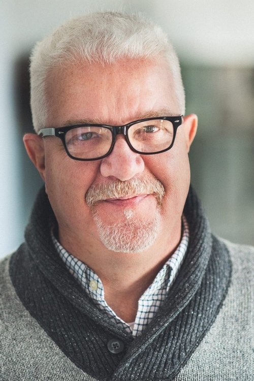 John Ralston as Technician / Villager