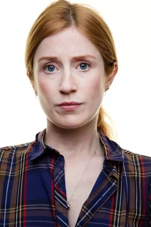 Elly Condron as Head Librarian