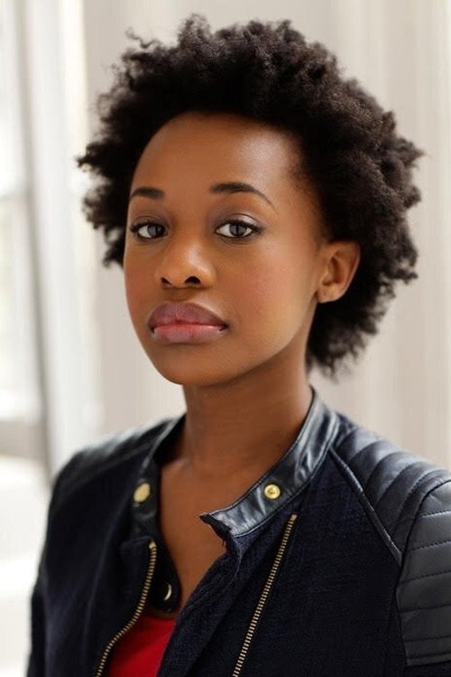 Mirirai Sithole as Coat-Check Girl