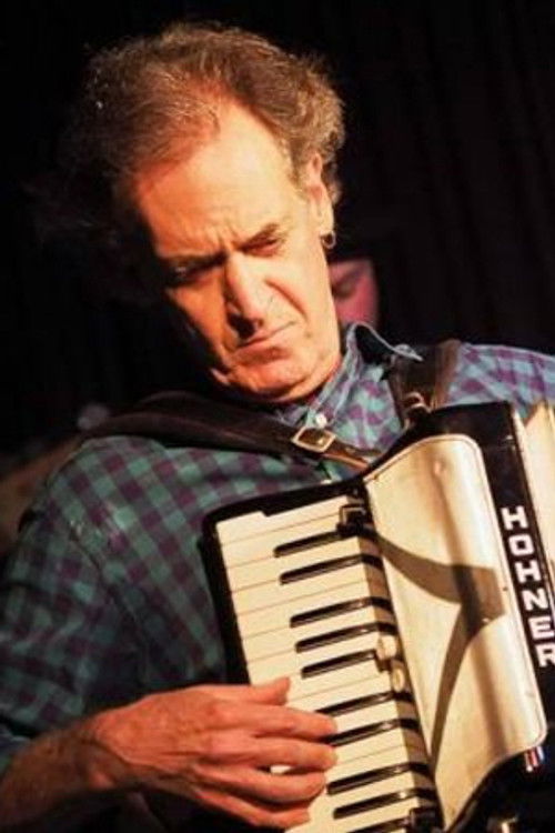 Steve Conn as Accordian