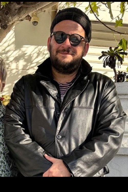 Roni Vainer as Bodyguard