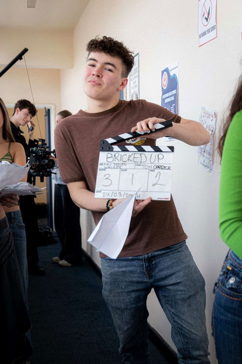 Sam Liddell as Podcast Host 2