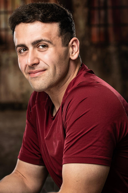 Chris Tarpos as Server (uncredited)