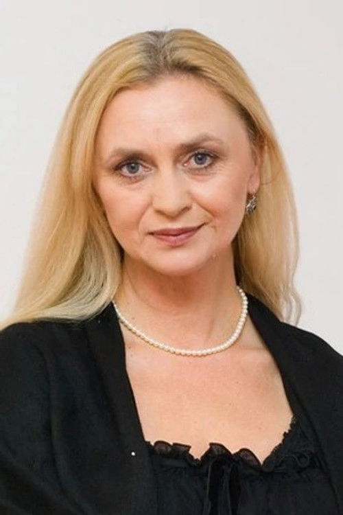 Barbara Zielińska as Basia, sekretarka dyrektora fabryki szczotek