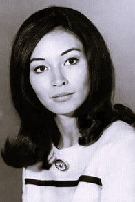Nancy Hsueh as Mia, orphan girl