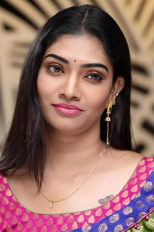 Krithika as Varsha (Nandini's cousin, Antagonist)
