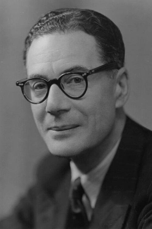 Val Gielgud as Julian Caird