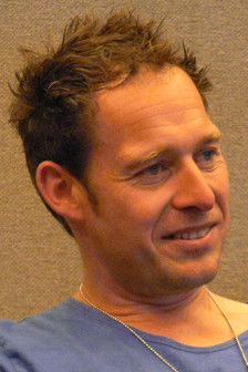 Colin Teague as Young Associate