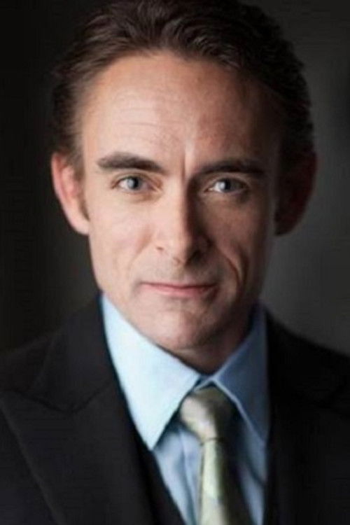 Tariq Leslie as The Handler