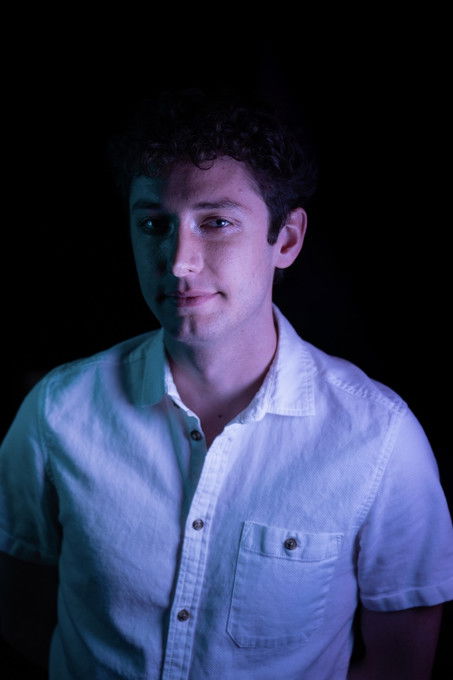 William Lund as August