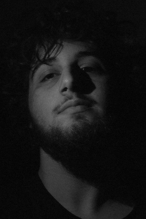 Chris Eight as Simone Rubin, il Professore