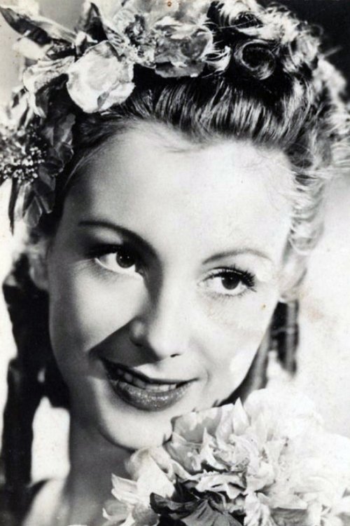 Janine Darcey as Louise