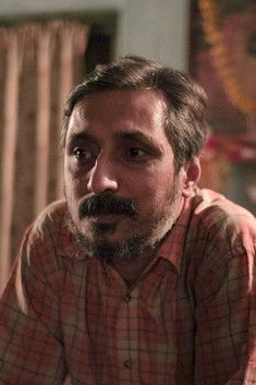 Satrajit Sarkar as The Security Guard