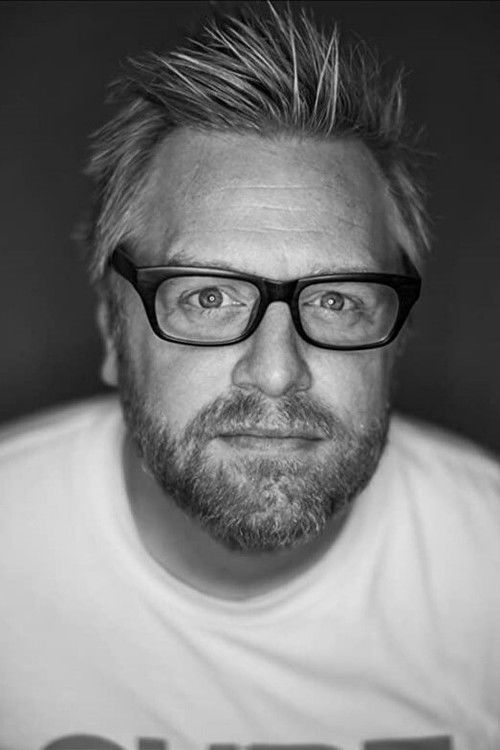 Michael Birkeland as Greg Blazer