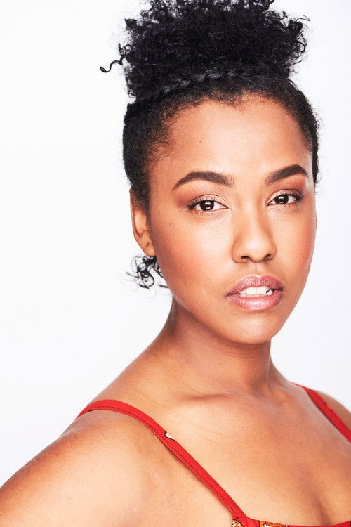 Kemiyondo Coutinho as HER