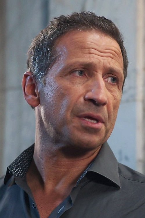 Daniele Marcheggiani as Padre di Caleb