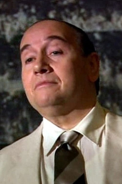 André Gomes as The man in the colorful shirt