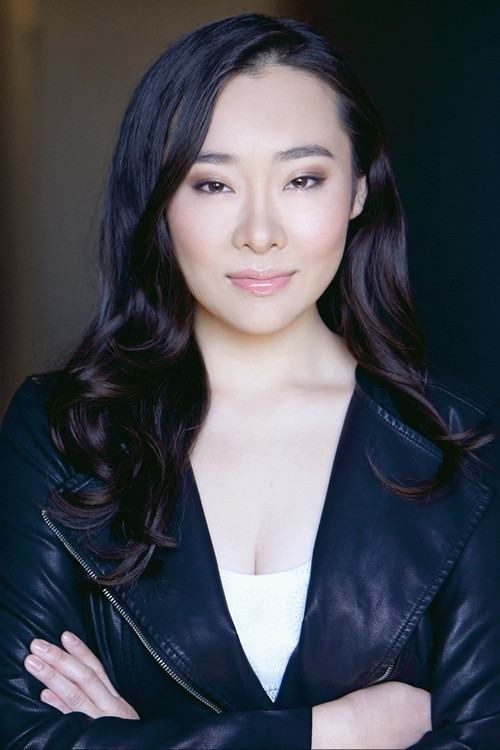 Mish Tam as News Reporter #2